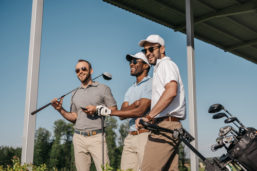 3 Guys Playing Golf